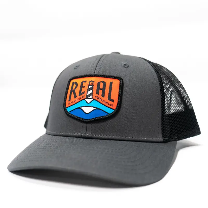 Real Lighthouse Badge Trucker Hat – Charcoal And Black 1